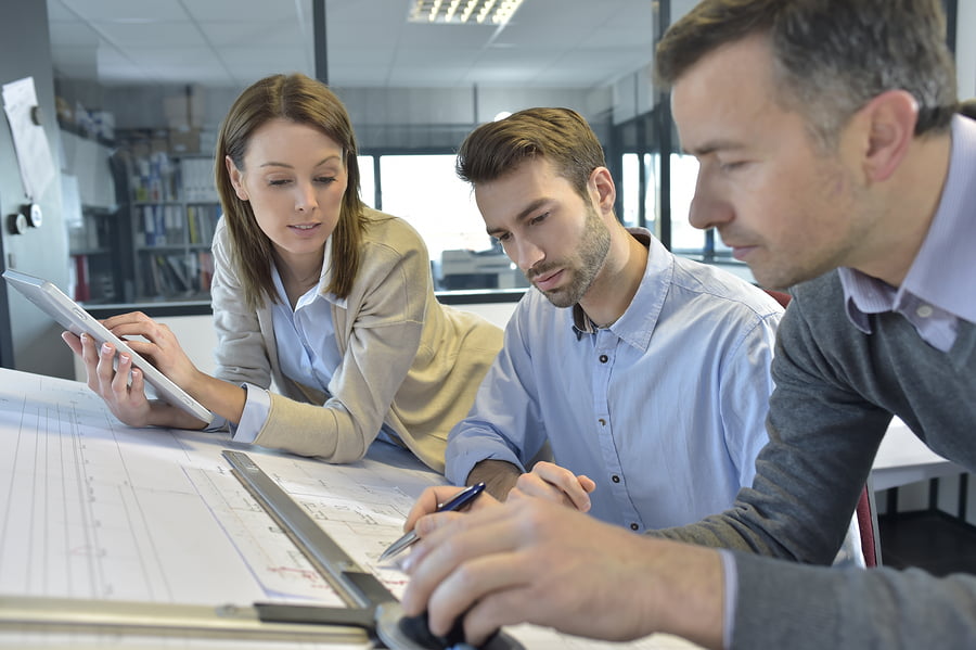 Team of architects working on tasks